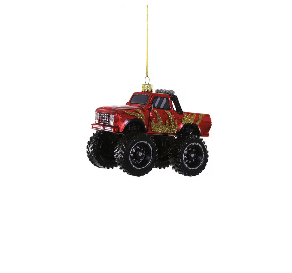 Glass red monster truck with gold glitter flames ornament.