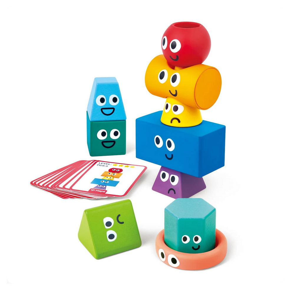 A group of colorful blocks in different shapes and bright colors with a deck of challenge cards. 
