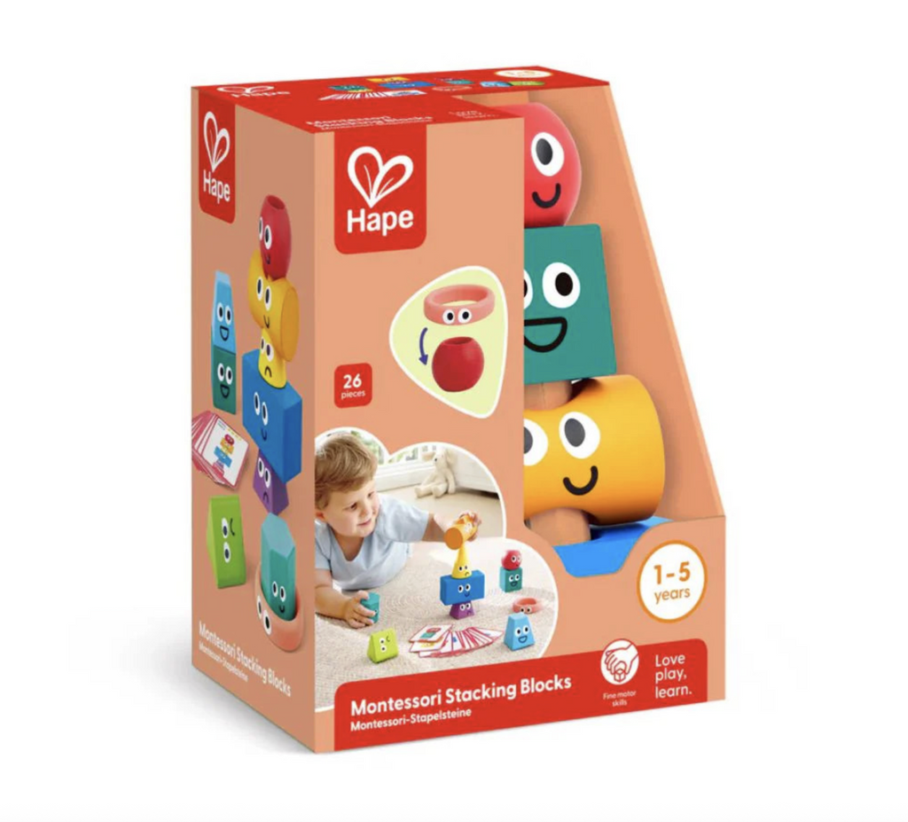 Montessori Stacking Blocks by Hape packaged in a box that is open on one corner that shows a few of the colorful blocks that have faces with different expressions on them. 