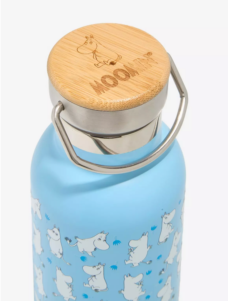 Blue water bottle with bamboo lid featuring the Moomin character on the top. 