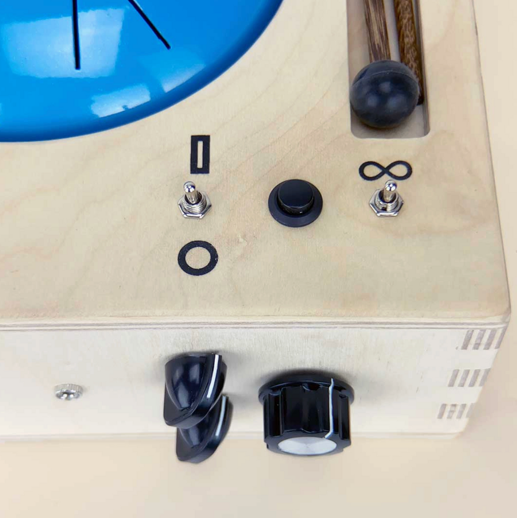 Closeup of the Mood Lander Tongue Drum Recorder switches, dials, pitch shifter, and delay.