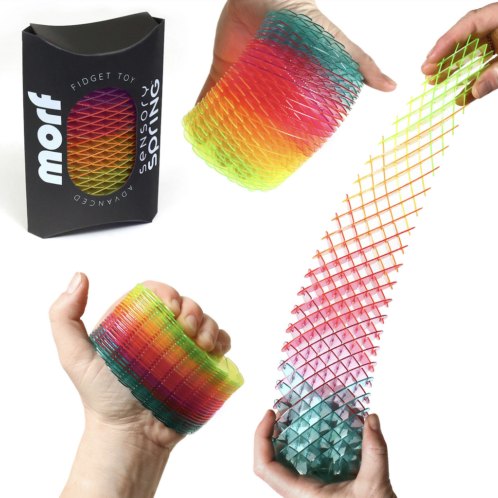 The Morf Big Spring Rainbow fidget toy shown packaged in it's black box with a small window, as well as in various states of play, from fully compacted in a hand to stretched to it's entirety there are so many ways to shape and play with it. 
