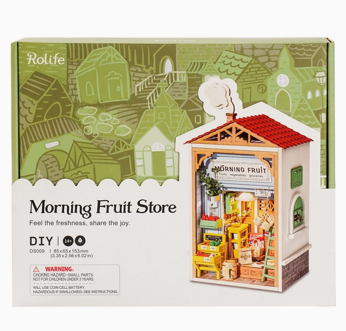 Box containing the Morning Fruit Store parts with a picture of the completed model. 