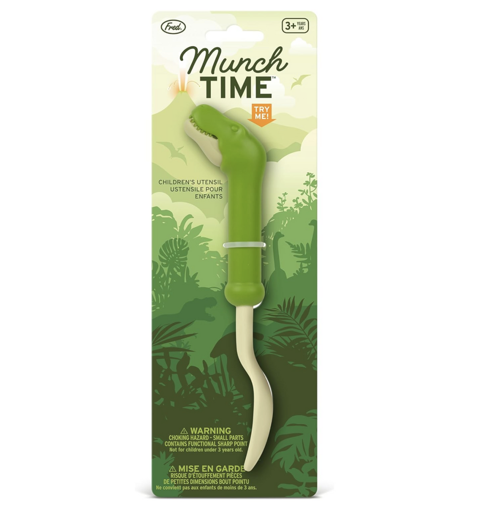 T Rex Spork attached to a hangcard with jungle foilage and dinosaur silhouettes. 