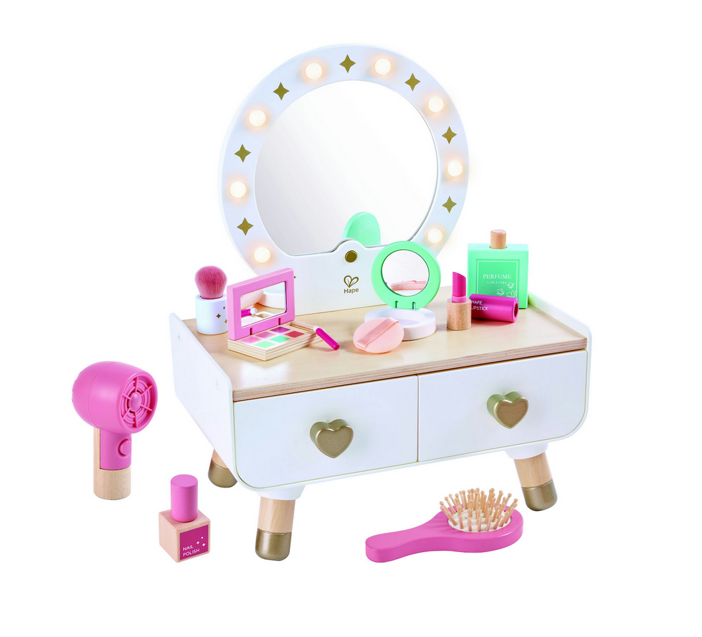 Toy vanity set with mirror, drawers, and various accessories.