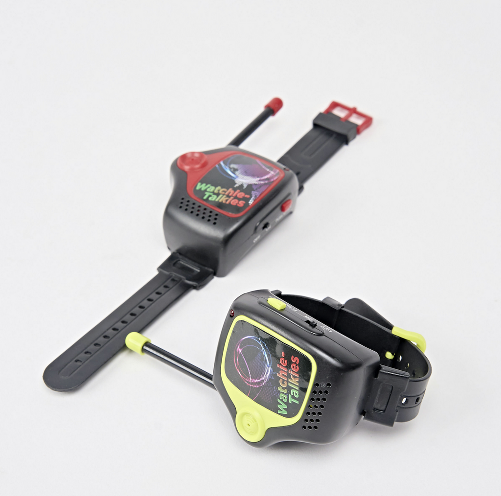Pair of Watchie Talkies, one yellow and the other red. Wearable watch like walkie talkies for on the go fun!