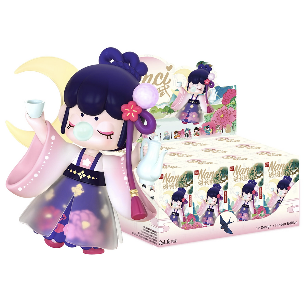 One of the Nanci Chinese Poetry figures from the series wearing a beautiful floral dress and holding a tea cup and pitcher. Beside her is a display box full of the blind boxes. 