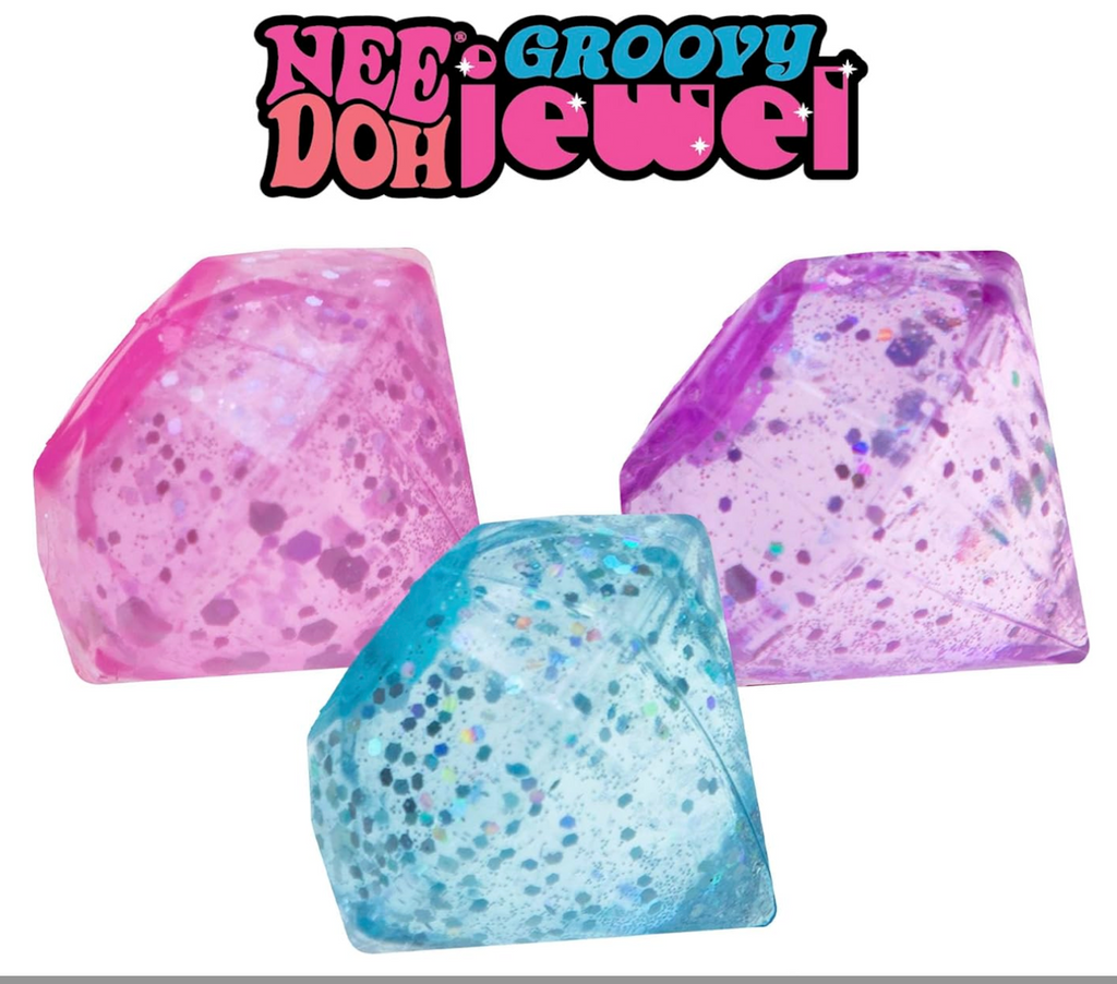 Three colorful gemstones with 'Nee Doh Groovy Jewel' written above them in bright sparkly lettering. There is one each of pink, blue and purple NeeDoh Groovy Jewels. 