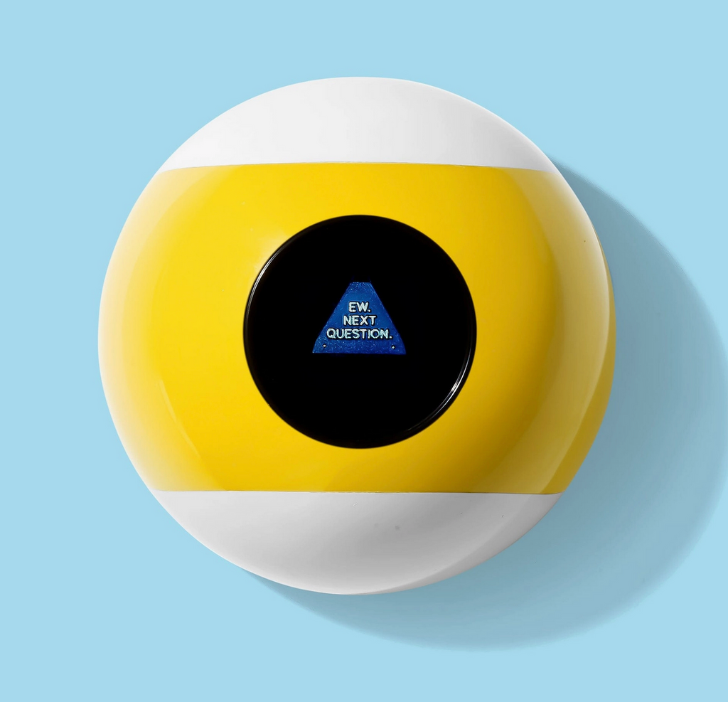 A question ball that looks like a yellow and white number 9 pool ball, with a round window where the answer to your question appears. 