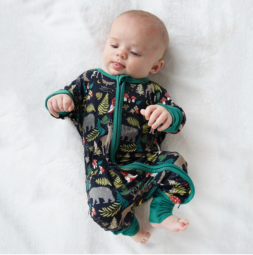 Baby in Night Forest bamboo pajamas.