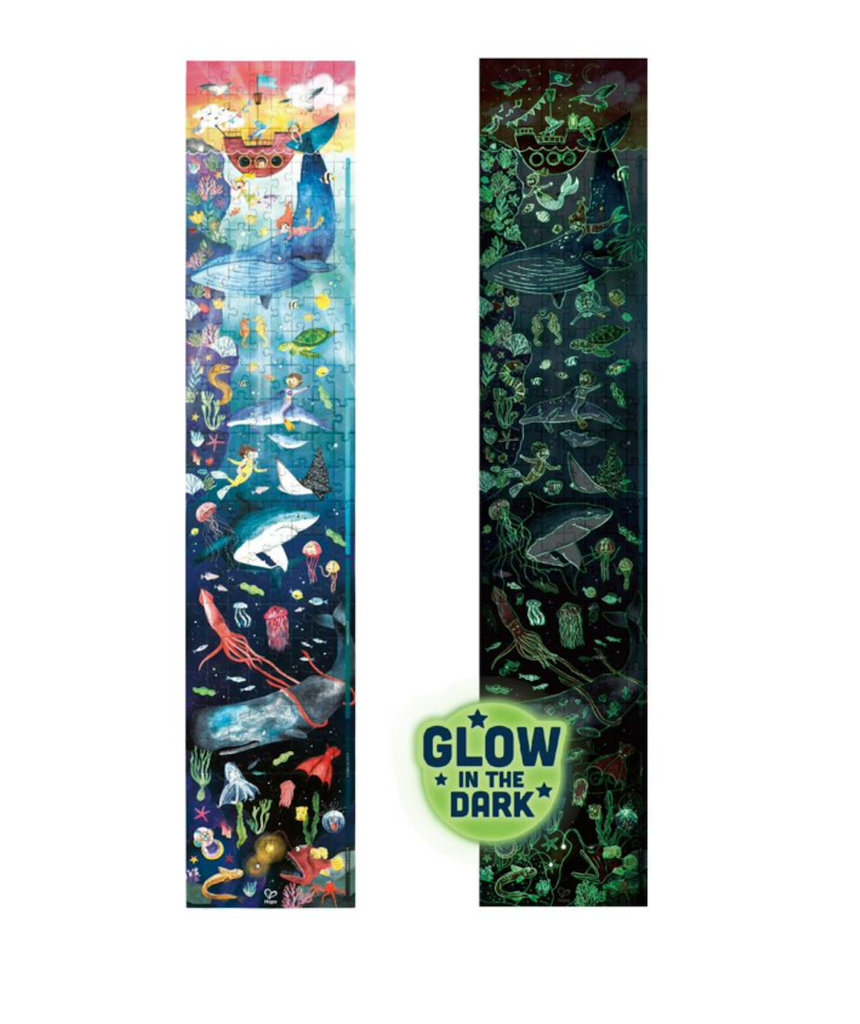 The Ocean Life 200 Piece puzzle assembled and shown in full color and glowing in the dark. 