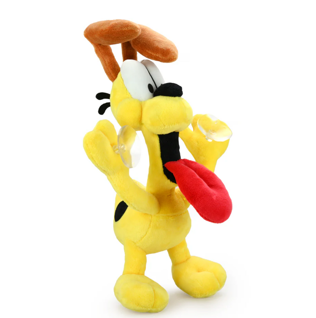 Side view of Odie plush dog with wagging tongue and suction cups on all four paws.