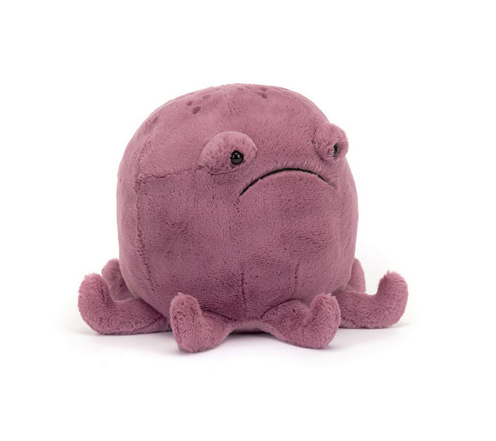 Ondre Octopus is a pudgy purple stuffed animal with short, stubby tentacles. 