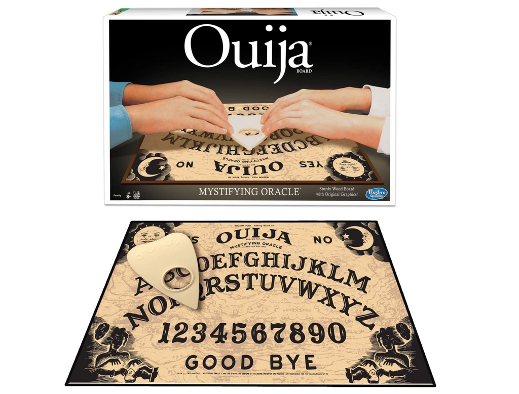 Ouija Board Game set up and ready to play with original graphics on the board. The box which depicts two people consulting the oracle is in the background. 