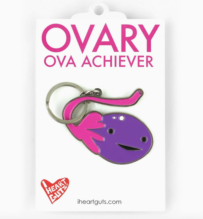Purple Ovary shaped enamel keychain with a silver ring.