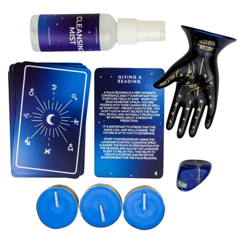 Contents of the Palm Reading Night Kit, the cleansing mist, tea light candles, ceramic palmistry hand, crystal and instruction cards. 