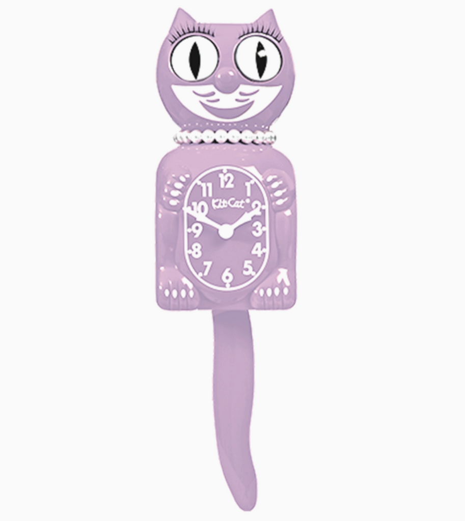 Lilac colored Kit Kat clock with eyelashes and pearls. 