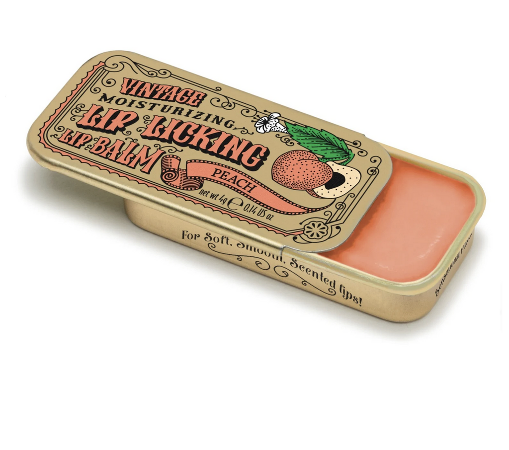 Peach flavored Lip Licking Lip Balm in a retro metal slider tin.