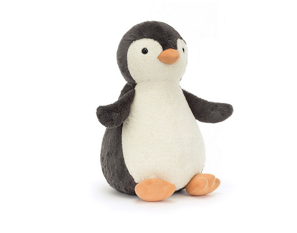 Big white and black seated penguin plush.