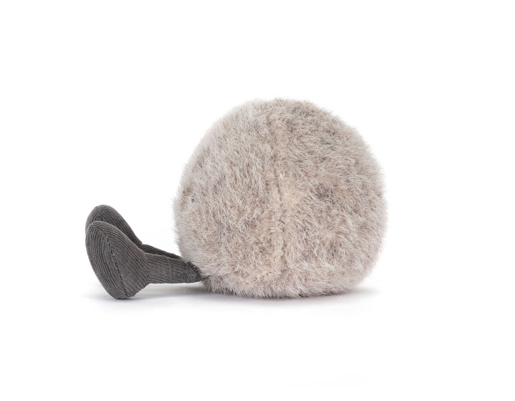A light gray fuzzy spherical plush toy with a dark gray tail, photographed on a clean white background.
