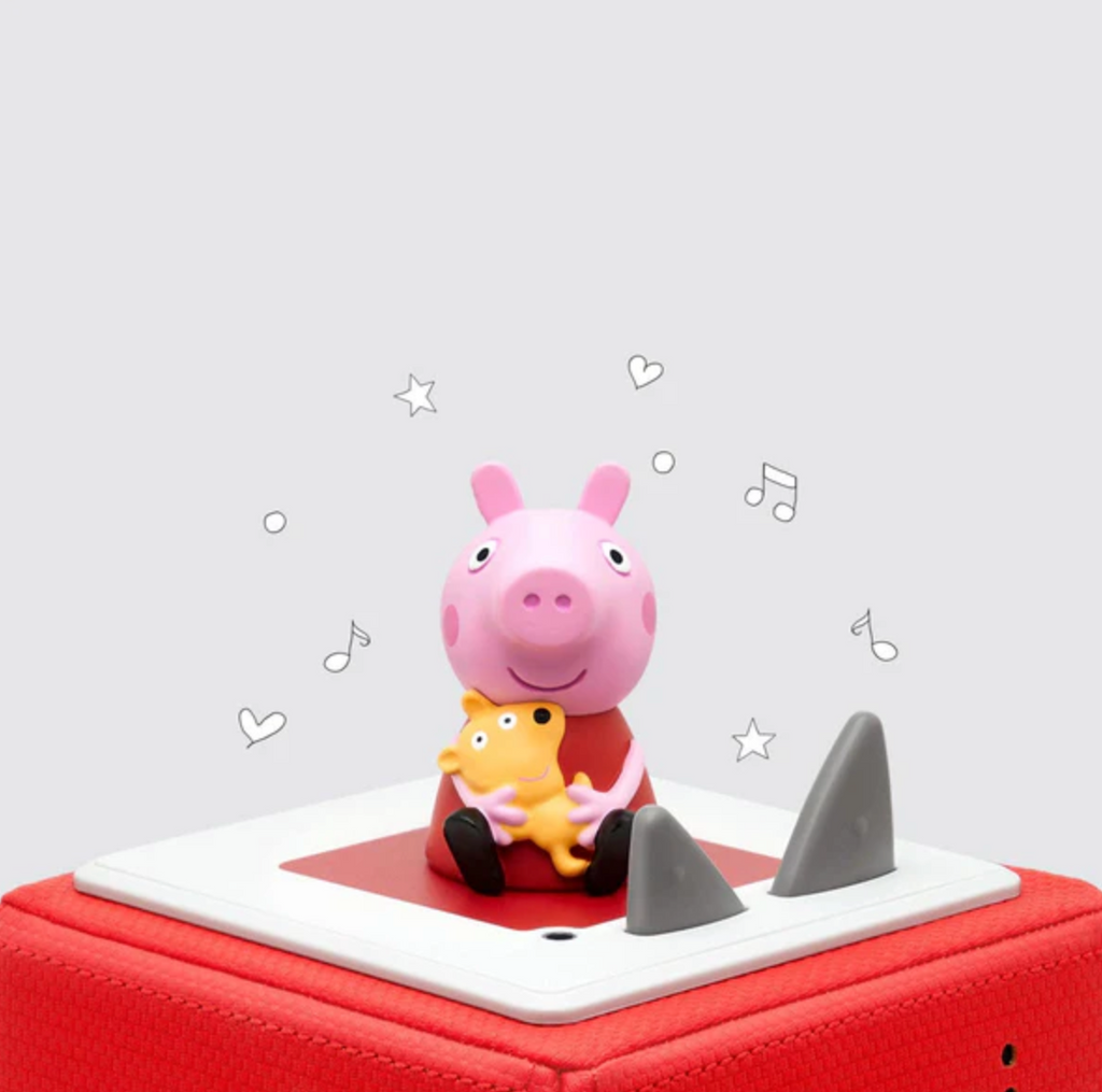 Peppa Pig Tonie figure on top of a red Toniebox player.