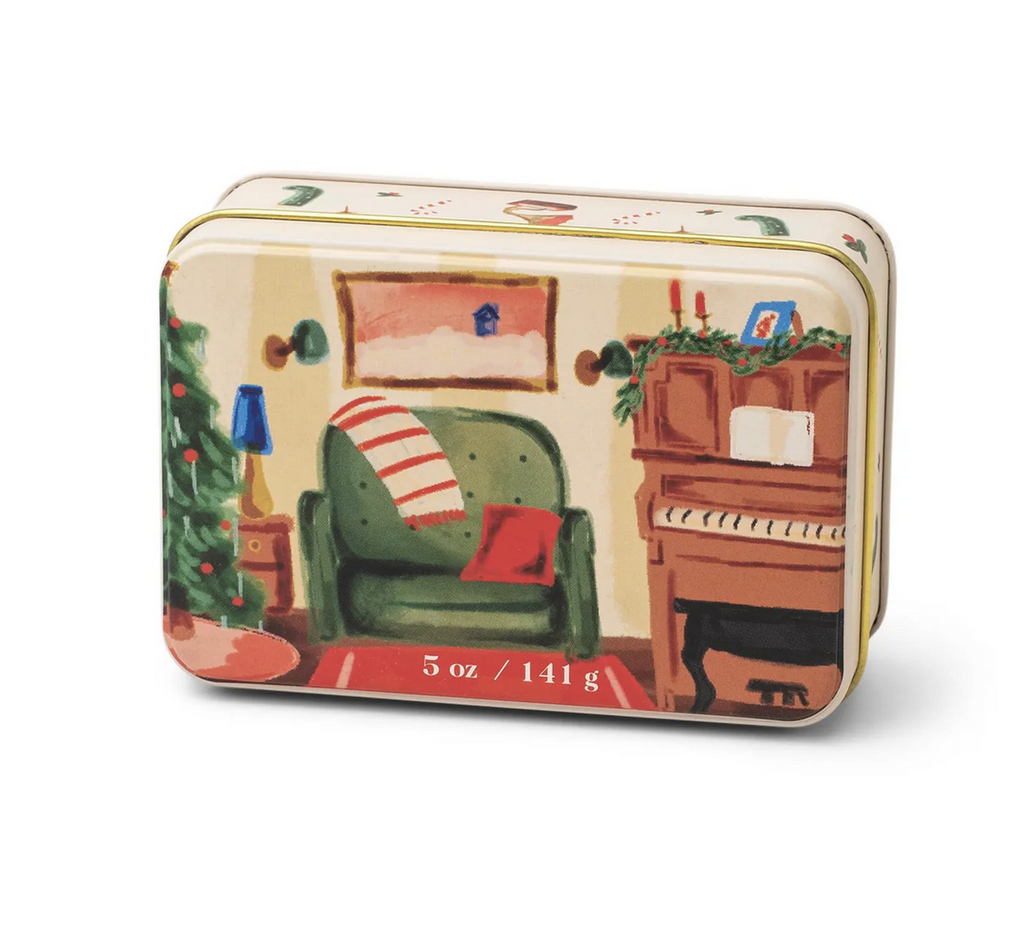 Rectangular shaped candle in an illustrated tin box.