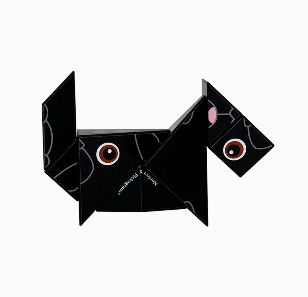 The Pickagram 3D Art Puzzle with artwork from Nerfect, with graphics that look like a pug, in white and black, shaped to look like a dog. 