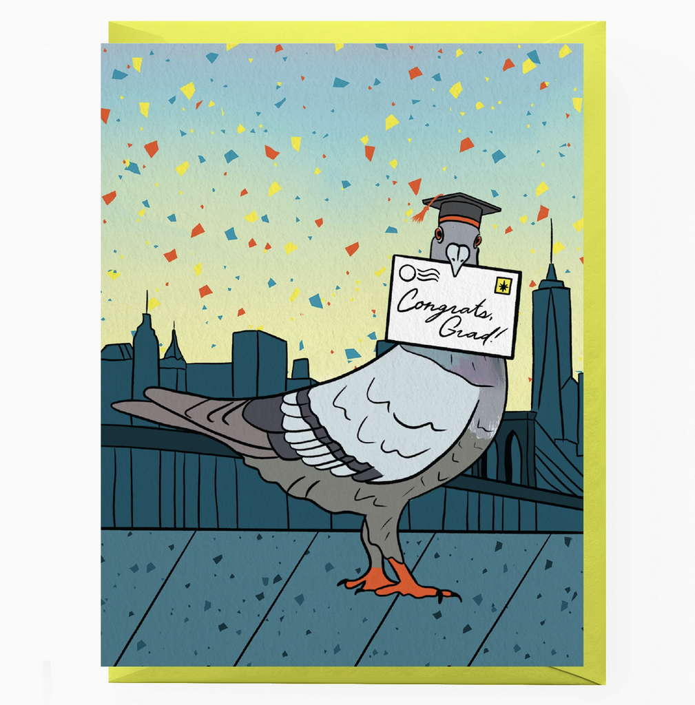 Illustrated greeting card featuring a pigeon wearing a graduation hat in front of the New York City skyline with confetti raining down. The pigeon is holding a letter in it's beak that reads "Congrats Grad!"
