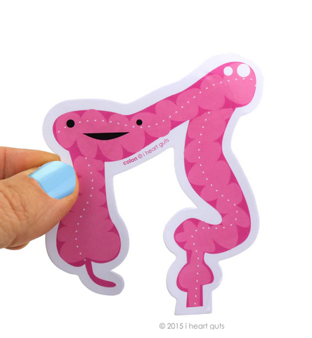 Close up of ponk colon shaped stickers. 
