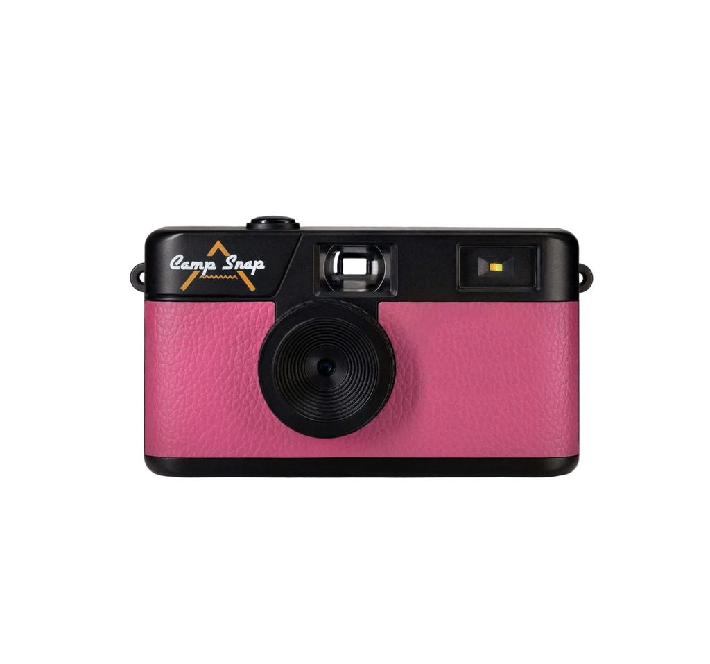 Pink and black digital Camp Snap camera on a white background