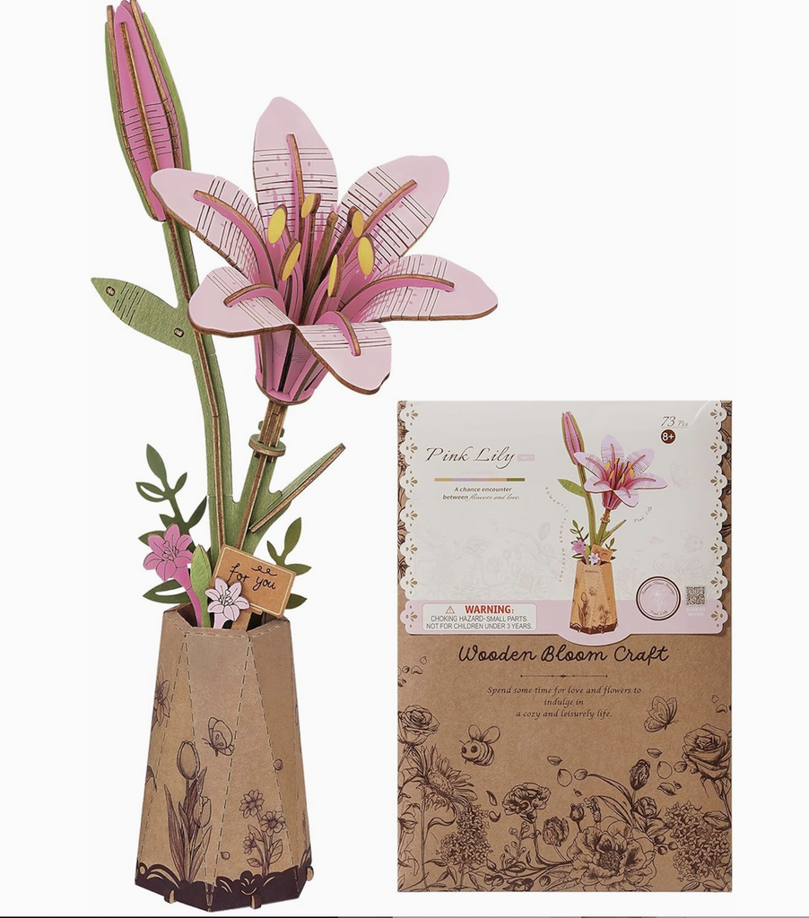 Pink Lily Wooden 3D Flower Bouquet completed and sitting beside the flat package it comes in. 