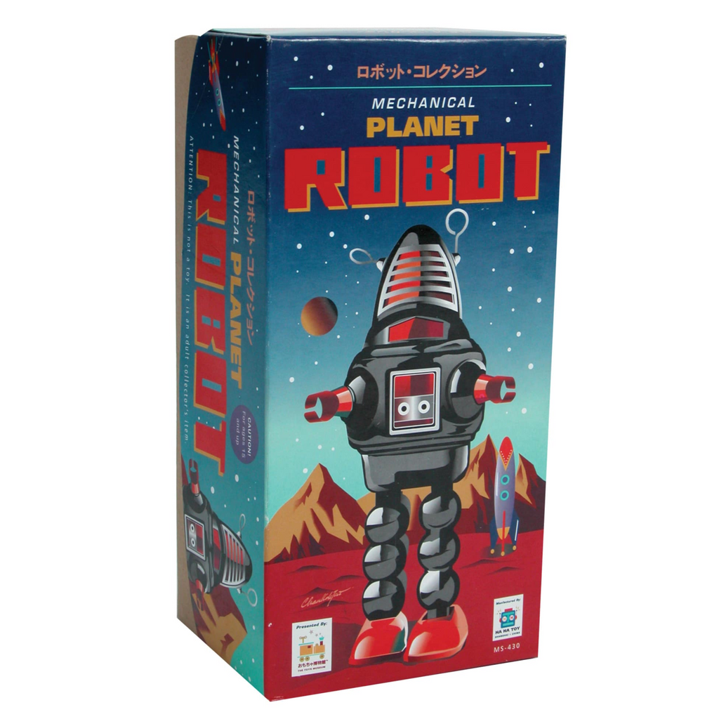 Box of Planet Robot classic tin robot features an illustration of a black Planet Robot n a planet with a rocket in the background.