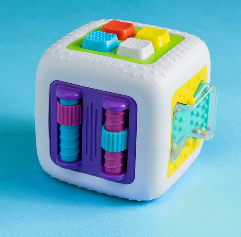 The PlayTab Cube filled with different PlayTab tiles on all sides. 