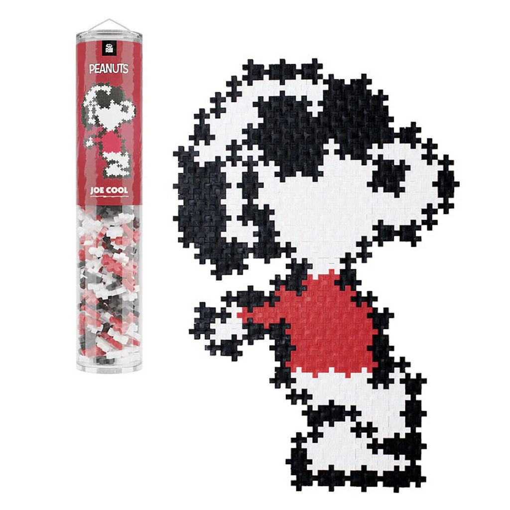 Clear tube with white, black and red plus plus pieces and an image of Snoopy as Joe Cool wearing black sunglasses and a red sweater. To the right of the tube is the completed puzzle. 