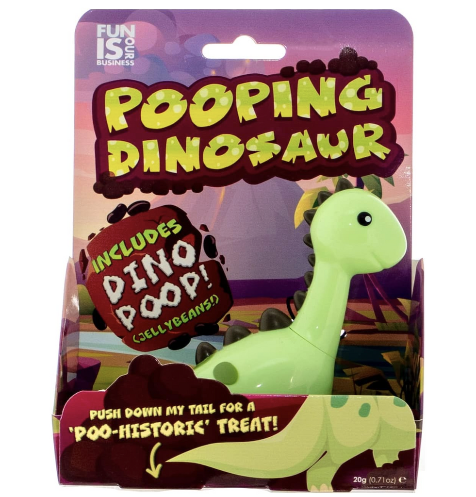 The Pooping Dinosaur is a toy candy dispenser. A green dinosaur packaged in an open box complete with brown jellybeans. 