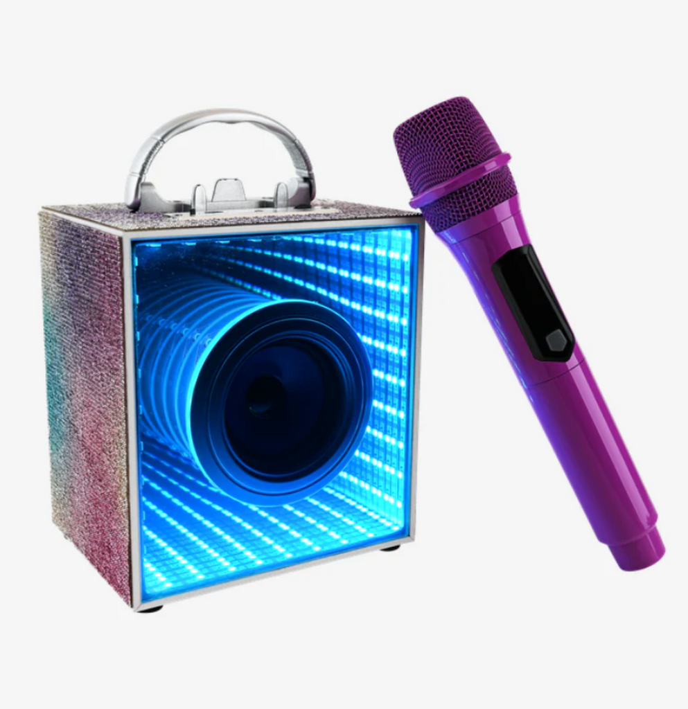 The Pop Star Karaoke Set with the blue tooth speaker lit up showing off the LED infinity lights and microphone. 