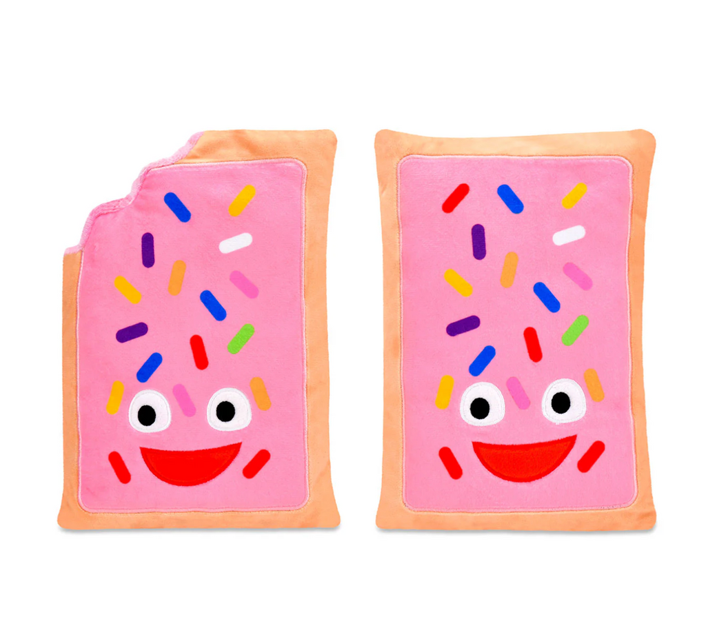 Two pink plush Pop Tarts with pink frosting and colorful sprinkles with goofy faces. One has a bite taken out of it already! They are both included inside the Pop Tarts plush box. 
