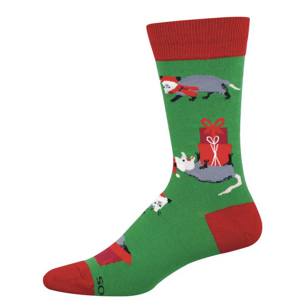 Green and red socks with possum Santa's rolling around with wrapped presents. 