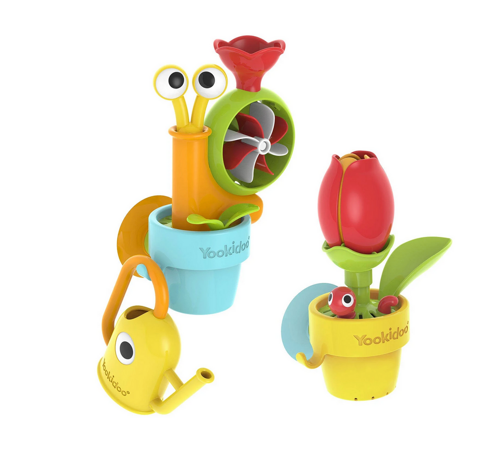 Watering can, flower pot and pop up snail toys from the Pour N Grow Pop Up Garden. 