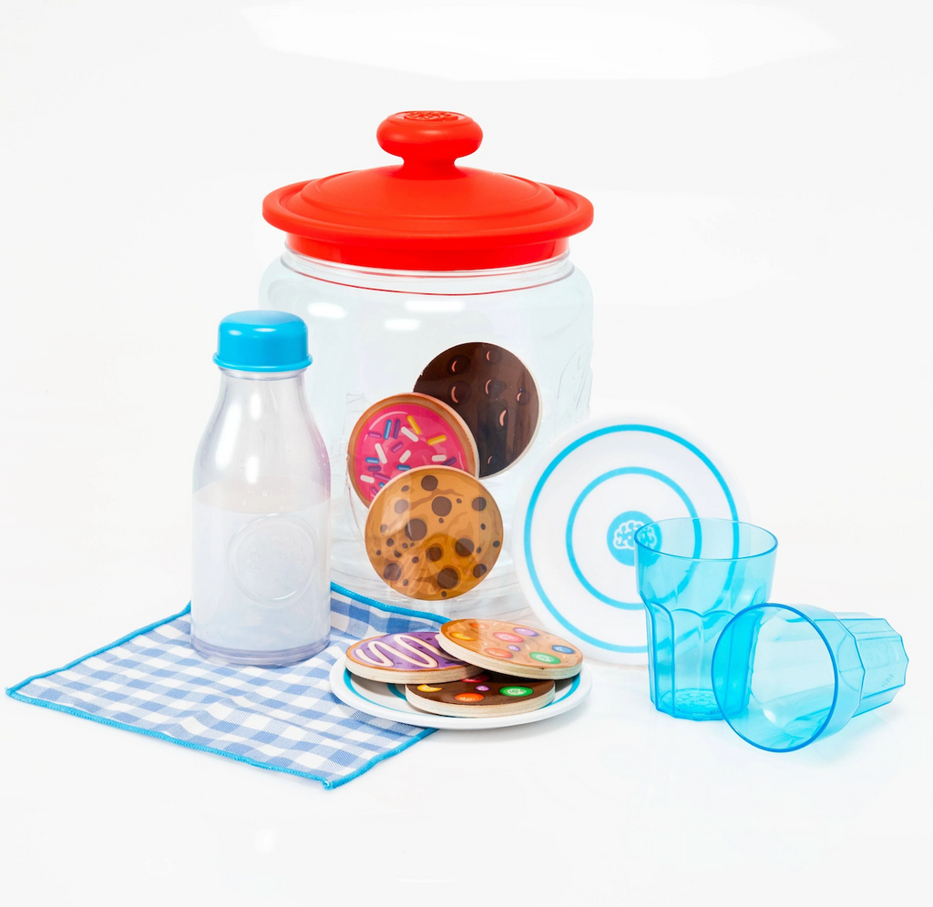 Pretendables Milk and Cookies set with the wooden cookies inside the jar, the plates and cups and magic milk bottle set up to enjoy. 