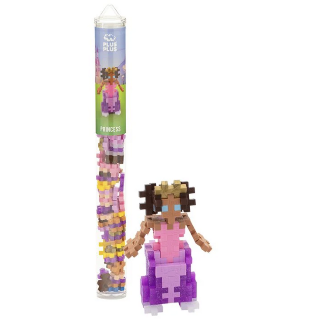 Plus Plus Princess Tube with a fairy built using pieces from the set. 