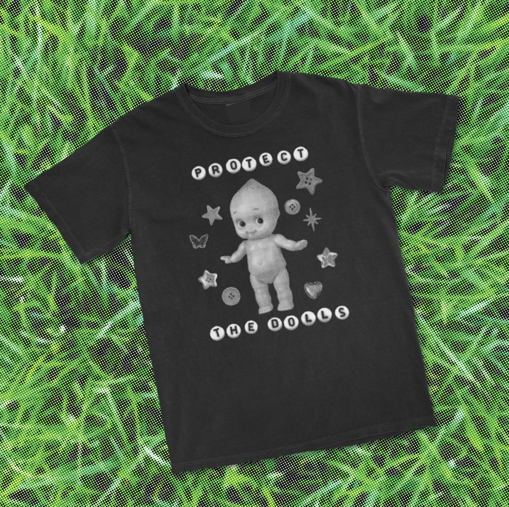 Black cotton tee with grey image of a kewpie doll and lettering that reads "Protect The Dolls". Size X-Large