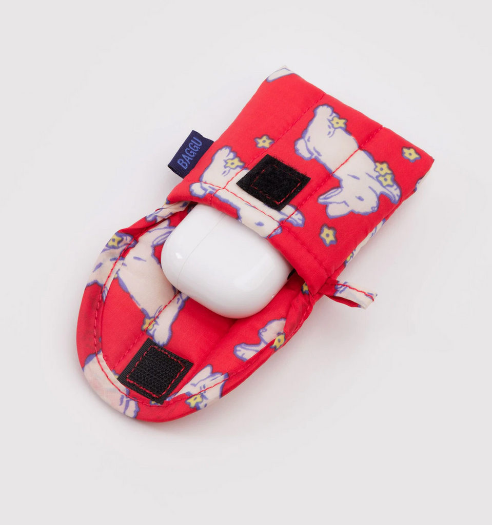 The Baggu Bunnies Puffy Earbuds Case holding a pair of earbuds in their white case. 