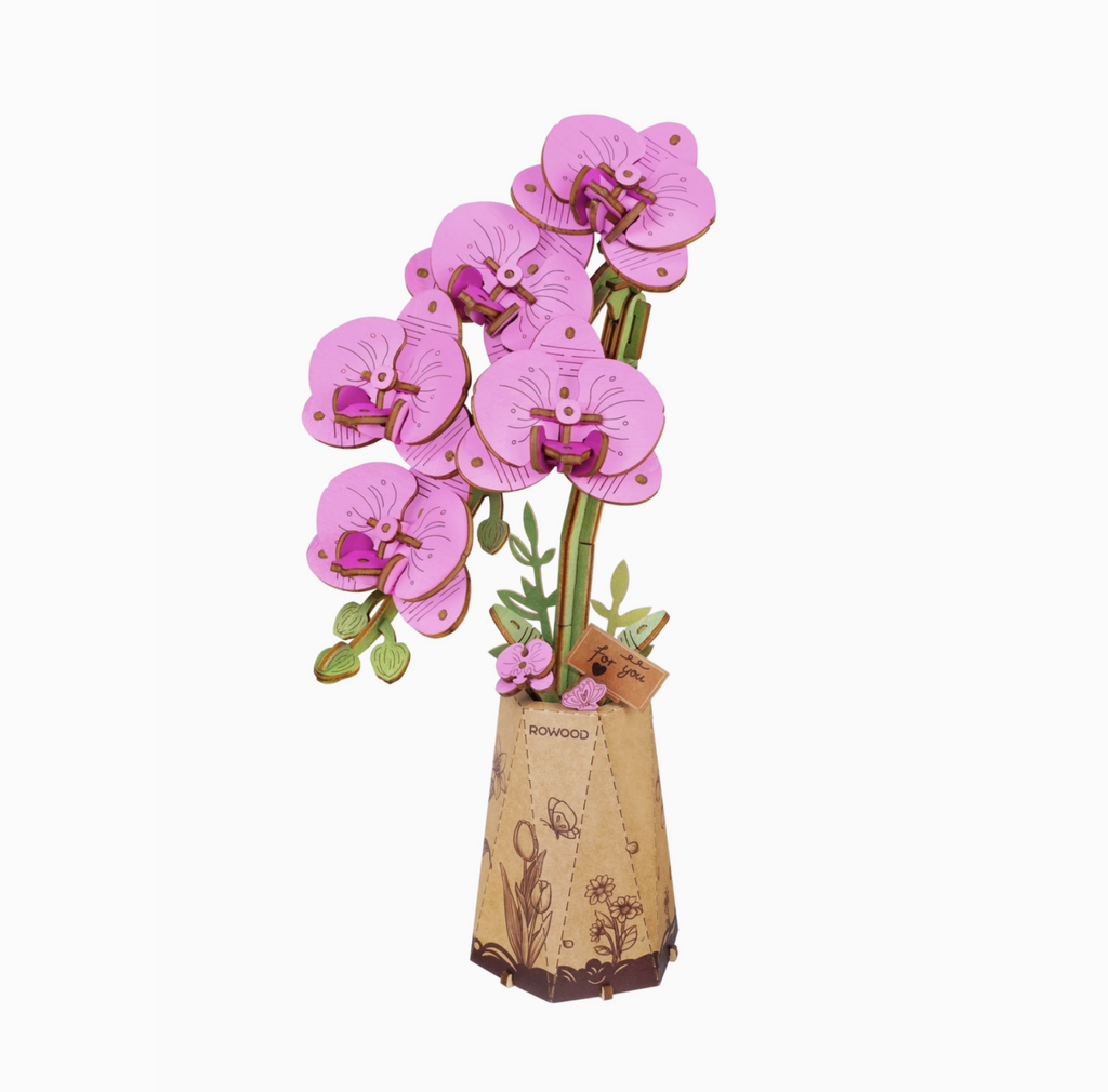 #d Wooden flower puzzle with purple moth orchid leaves arranged in a wooden vase.