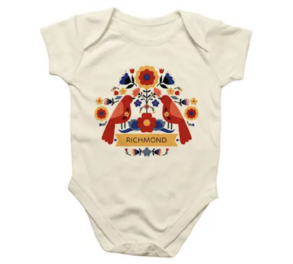 Baby snap suit with illustrated image of a Scandinavian inspired floral bird design with Richmond written on the front. Size x-large 12-16 months. 