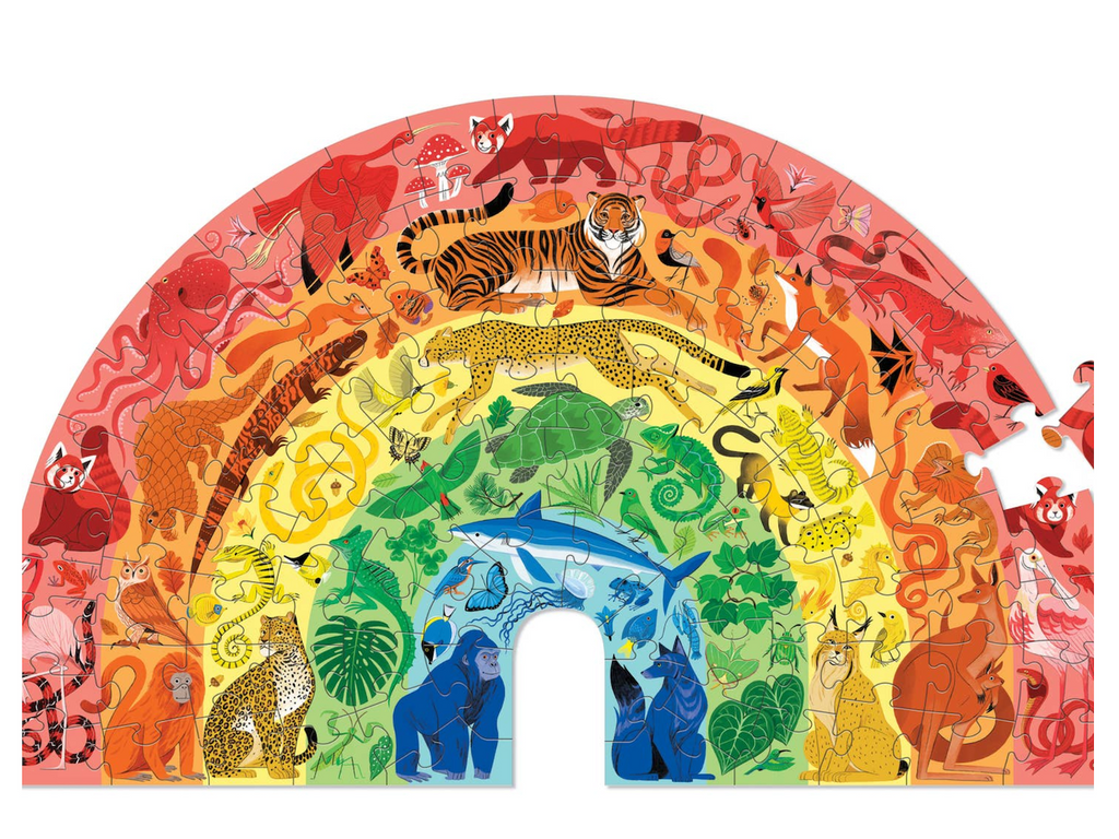 The colorful Rainbow Animals 100 piece puzzle depicting a rainbow filled with animals and nature scenes.