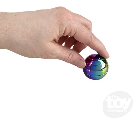 A picture of a hand holding the rainbow gyroscope sphere. 
