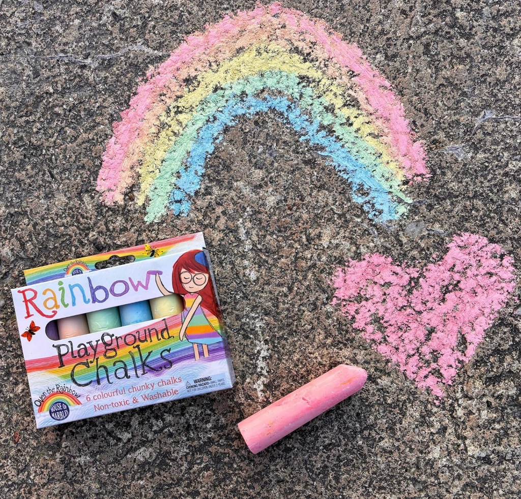 Box of Rainbow Playground Chalks with a rainbow and heart drawn on pavement