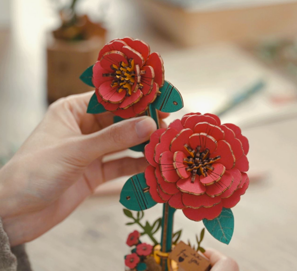 https://worldofmirth.com/cdn/shop/files/RedCamelliaDIYWoodenFlower3D1_1024x1024.png?v=1701723420