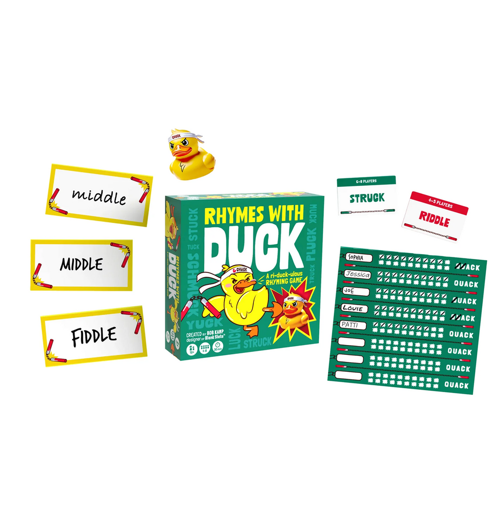 Rhymes with Duck board game set, including the green game box with duck illustrations, a small yellow rubber duck, four labeled cards with rhyming words, and a green score sheet.